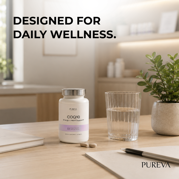 Pureva COQ10 bottle on wooden desk with water glass, capsules, plant and notebook in bright workspace setting